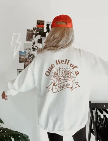 LOLA MAGNOLIA ONE HELL OF A MOTHER WOMEN'S CREWNECK | WHITE/RUST
