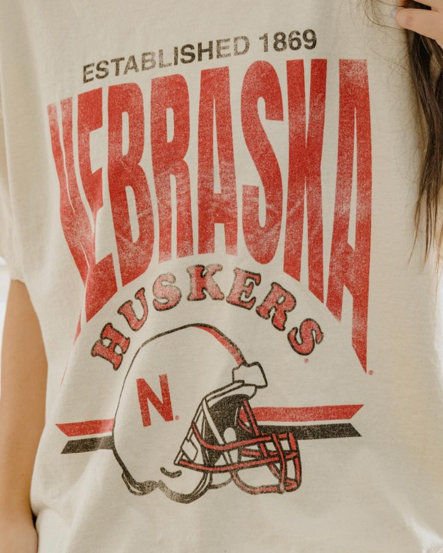 NEBRASKA HUSKERS HELMET CREAM TEE | BABY, KIDS + YOUTH