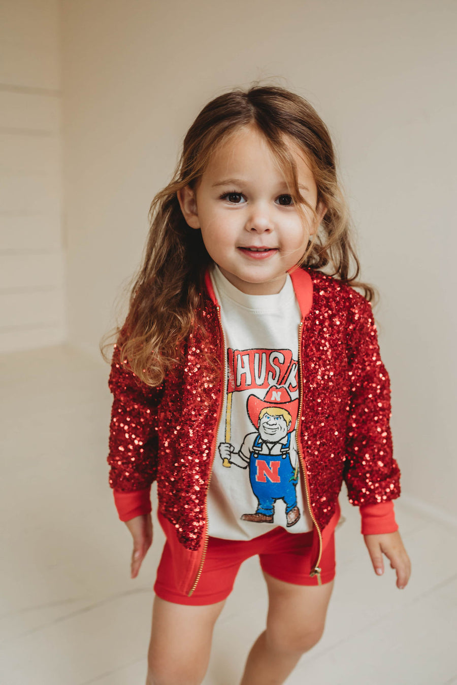 NEBRASKA HUSKERS MASCOT CREAM TEE | BABY, KIDS + YOUTH