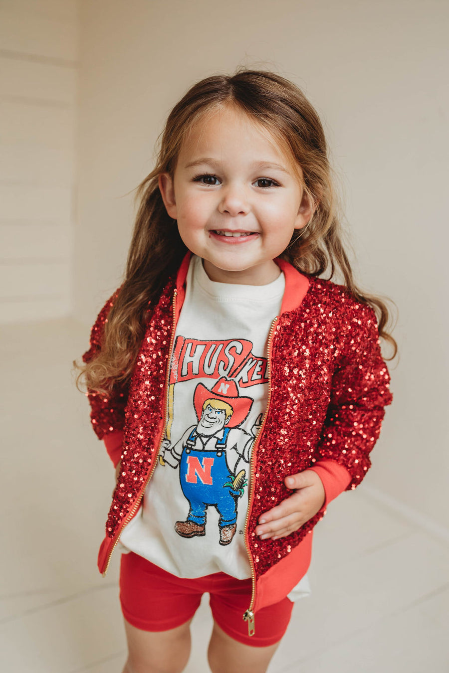 NEBRASKA HUSKERS MASCOT CREAM TEE | BABY, KIDS + YOUTH