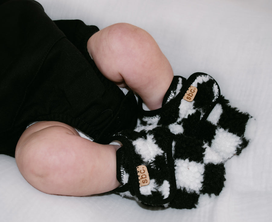 SHORE BABY The Newborn Sherpa Bootie — Black + White Checkered (COLLECTIVE)